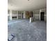 Unfinished living room featuring a staircase and fireplace, ready to be finished at 14910 Garden Mist Pl, Fishers, IN 46037