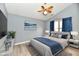 This primary bedroom features neutral colors, vaulted ceiling, and ample sunlight at 1632 Blankenship Dr, Indianapolis, IN 46217