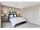 Cozy bedroom with tasteful decor, modern lighting, and a neutral color palette at 16930 Sandhurst Pl, Westfield, IN 46074