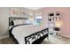 Stylish bedroom features a modern bed frame and unique shelving at 16930 Sandhurst Pl, Westfield, IN 46074