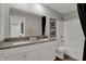 Modern bathroom with double vanity, white cabinetry, and a shower-tub combination at 17001 Fulsam St, Westfield, IN 46074