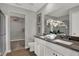 Elegant bathroom featuring double sinks, modern fixtures, and a walk-in closet at 17001 Fulsam St, Westfield, IN 46074
