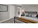 Cozy bedroom featuring a bed with unique tractor-themed decor and neutral gray walls at 17001 Fulsam St, Westfield, IN 46074