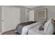 Serene bedroom with neutral tones, sliding closet doors, and a cozy bed with stylish pillows at 17001 Fulsam St, Westfield, IN 46074
