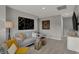 Relaxing living room with stylish decor, comfortable seating, and a serene atmosphere at 17001 Fulsam St, Westfield, IN 46074