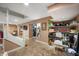 Finished basement with open stairwell, white walls, storage area, and potential for versatile use at 171 W 44Th St, Indianapolis, IN 46208