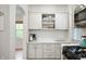 Bright kitchen featuring white cabinets, subway tile backsplash, and stainless steel appliances at 171 W 44Th St, Indianapolis, IN 46208