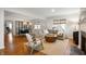 Open living space featuring a dining area, living room, and beautiful hardwood floors at 171 W 44Th St, Indianapolis, IN 46208