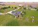 Aerial of beautiful two story home with landscaped yard and fire pit overlooking the lawn at 180 S 400 W, Lebanon, IN 46052