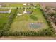 Overhead shot of a home with a pond, a detached garage, and a meticulously maintained lawn at 180 S 400 W, Lebanon, IN 46052