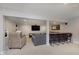 Basement living area with sofas and bar with seating at 180 S 400 W, Lebanon, IN 46052
