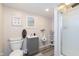 Bathroom featuring toilet, unique urinal, vanity, and walk-in shower at 180 S 400 W, Lebanon, IN 46052