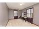 Bedroom with table and chairs underneath two windows at 180 S 400 W, Lebanon, IN 46052