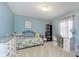 Comfortable bedroom with a daybed, desk, and ample natural light at 180 S 400 W, Lebanon, IN 46052