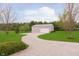 Outbuilding featuring a white garage door and pea gravel driveway at 180 S 400 W, Lebanon, IN 46052