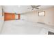 An expansive, finished basement with modern lighting and wall-to-wall carpet at 1907 N Washington St, Danville, IN 46122