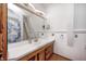 Bright bathroom showcasing a white countertop, wood-style floors, and modern lighting at 1907 N Washington St, Danville, IN 46122