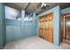 This bedroom offers wood closet doors and scenic wall decor at 1907 N Washington St, Danville, IN 46122