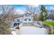 Charming home featuring a unique architectural design, with a spacious driveway and well-maintained landscaping at 1907 N Washington St, Danville, IN 46122