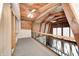 This hallway provides wood beam ceilings and ironwork accents at 1907 N Washington St, Danville, IN 46122