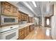 Spacious kitchen with wood cabinets and countertops with an attached spiral staircase at 1907 N Washington St, Danville, IN 46122