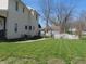 Spacious backyard with well-maintained lawn and pergola at 210 E Monroe St, Alexandria, IN 46001