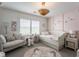 Charming bedroom with whimsical decor and unique lighting at 222 E 71St St, Indianapolis, IN 46220