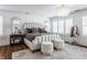 Beautiful primary bedroom with decorative chandelier and large windows at 222 E 71St St, Indianapolis, IN 46220