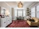 Cozy home office with large windows and designer light fixture at 222 E 71St St, Indianapolis, IN 46220
