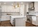 Spacious kitchen with stainless steel appliances and granite counters at 222 E 71St St, Indianapolis, IN 46220