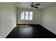 This spacious bedroom has beautiful hardwood floors, a ceiling fan and great natural light at 2250 N Capitol Ave, Indianapolis, IN 46208