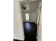 A bright, well-lit bedroom with hardwood floors, a ceiling fan, and a closet at 2250 N Capitol Ave, Indianapolis, IN 46208