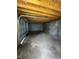 Bare garage interior with concrete block walls, concrete floor and exposed wood rafters at 2250 N Capitol Ave, Indianapolis, IN 46208