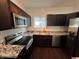 Well-equipped kitchen with stainless steel appliances and granite countertops at 2250 N Capitol Ave, Indianapolis, IN 46208