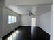 An open-concept living room featuring hardwood floors, recessed lighting, and plenty of natural light at 2250 N Capitol Ave, Indianapolis, IN 46208
