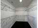 Walk-in closet features wire shelving and dark wood floors for ample storage space at 2250 N Capitol Ave, Indianapolis, IN 46208