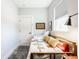 Cozy bedroom with a daybed, natural light, and simple decor, perfect for a guest room at 2329 Shelby St, Indianapolis, IN 46203