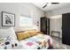 Bright bedroom with a comfortable bed, a ceiling fan, and natural light from the window at 2329 Shelby St, Indianapolis, IN 46203