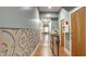 Bright hallway with unique wall paneling and natural light streaming in from the end at 2329 Shelby St, Indianapolis, IN 46203