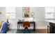 Cozy home office featuring a modern desk setup, stylish decor, and natural light from nearby windows at 2329 Shelby St, Indianapolis, IN 46203