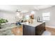 Modern kitchen with an island, sleek cabinets, stainless steel appliances, and stylish countertops at 2329 Shelby St, Indianapolis, IN 46203