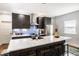 Modern kitchen with a large island, seating, and sleek cabinetry and appliances at 2329 Shelby St, Indianapolis, IN 46203