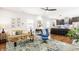 Bright, open living room featuring modern furnishings and stylish decor with a view of the kitchen at 2329 Shelby St, Indianapolis, IN 46203