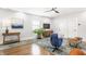 Relaxing living room featuring hardwood floors, a stylish rug, and modern decor at 2329 Shelby St, Indianapolis, IN 46203