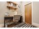 Cozy home office with a functional desk setup, shelving, and natural light for a productive workspace at 2329 Shelby St, Indianapolis, IN 46203