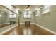 Spacious studio featuring hardwood floors, large mirror, and ample space for creative activities or fitness at 2329 Shelby St, Indianapolis, IN 46203