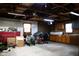 Spacious basement area with ample storage, work space, and concrete flooring at 248 Parkview Dr, Whiteland, IN 46184
