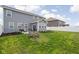 Inviting backyard featuring a fire pit, patio, and manicured lawn, perfect for outdoor entertaining and relaxation at 2536 Maricopa Blvd, Whitestown, IN 46075