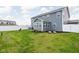 Spacious backyard with a well-maintained lawn, white fence, and patio area perfect for outdoor gatherings and recreation at 2536 Maricopa Blvd, Whitestown, IN 46075
