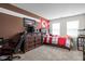 Bedroom showcasing dark wood floors and neutral paint tones at 2536 Maricopa Blvd, Whitestown, IN 46075